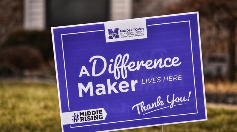 Teachers and other staffers of Middletown Schools got a recent surprise when they came home from work to find yard signs praising their work during the coronavirus pandemic. (Photo by Nick Graham\Journal-News)