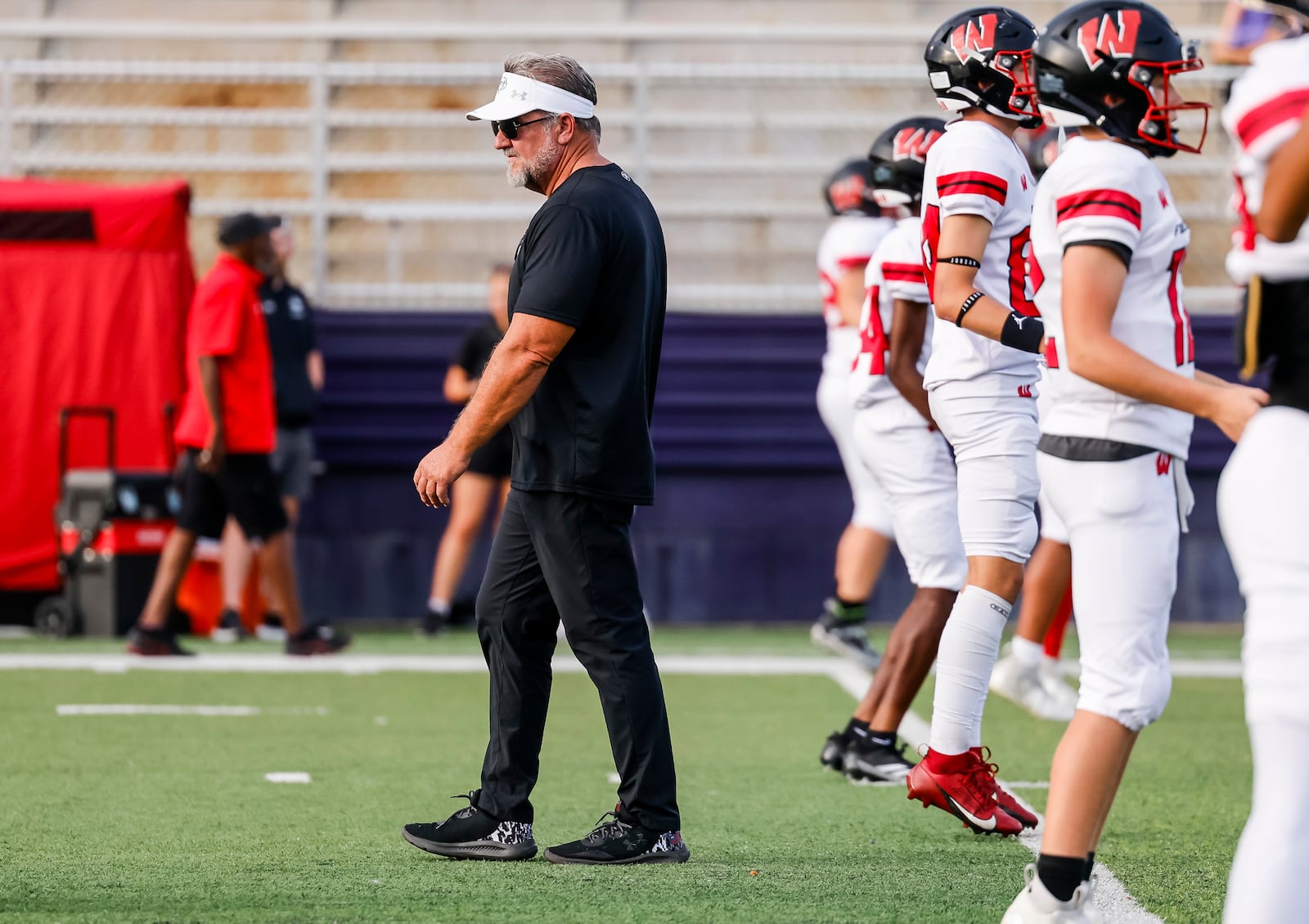 Lakota West head coach Tom Bolden walks the field before their 51-7 win over Middletown in their football game Friday, Sept. 20, 2024 at Barnitz Stadium in Middletown. NICK GRAHAM/STAFF