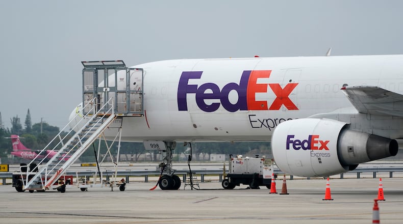 FILE-A FedEx cargo plane is shown on the tarmac at Fort Lauderdale-Hollywood International Airport, Tuesday, April 20, 2021, in Fort Lauderdale, Fla. (AP Photo/Wilfredo Lee, File)