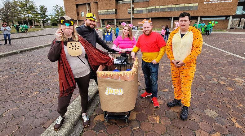 The Middletown Kiwanis will host the 5th Annual “Book Around Middletown” Shopping Cart Challenge Race on March 4. Pictured is a team that participated in the Kiwanis Club of Middletown 2021 Book Around Middletown Shopping Cart Challenge March 13, 2021. NICK GRAHAM/STAFF