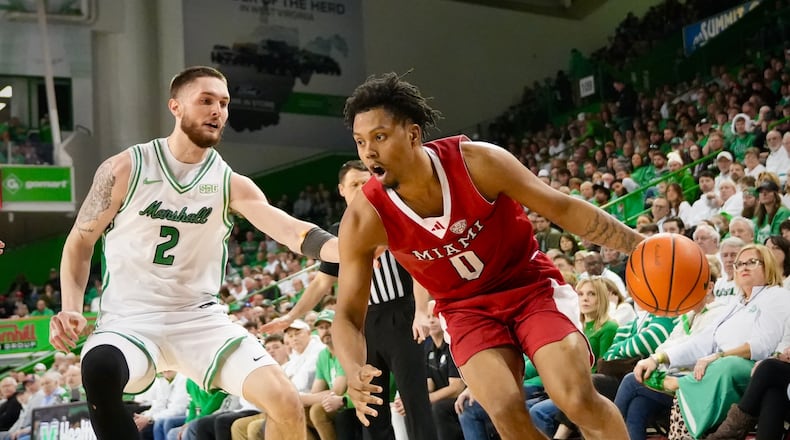 Miami’s Eian Elmer drives the lane against Marshall on Saturday, Feb. 7, 2026 at the Cam Henderson Center in Huntington, W. Va. NOAH MAURER / NM CREATIVE