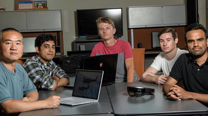 From left: Yong Pei, associate professor of computer science and engineering, and student researchers Miteshkumar Vasoya, Chris Rave, Logan Frank and Ashutosh Shivakumar. (Photo provided by Erin Pence, Wright State University).
