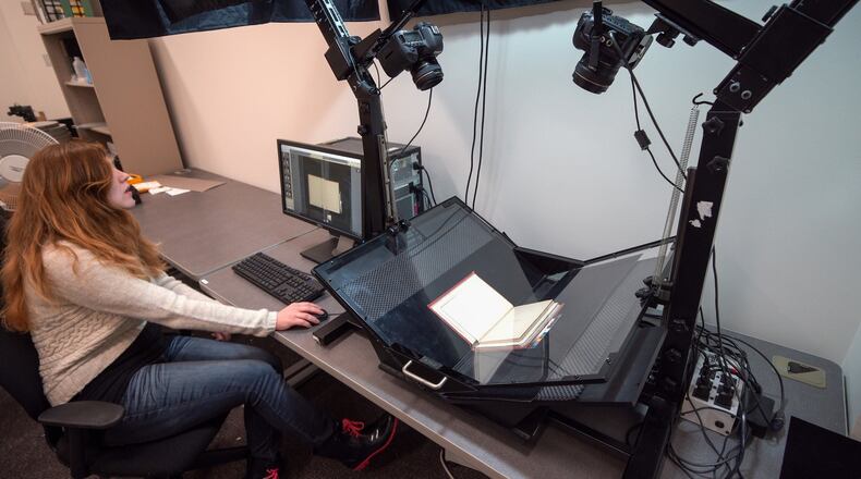 Digitizing a host of university publications will make them available to people around the world now, thanks to grants from the W.E. Smith Charitable Trust. The process allows the work to be done in-house faster than it could be done having it done by an outside business. CONTRIBUTED