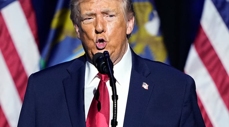 President Donald Trump speaks at the Detroit Economic Club, Tuesday, Jan. 13, 2026 in Detroit. (AP Photo/Ryan Sun)