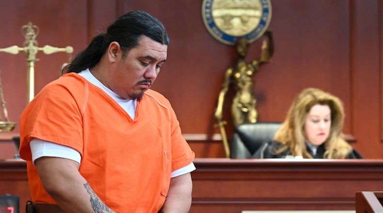 Robert Spottedhorse, 43, of Hamilton, walks to the center of the courtroom ahead of pleading guilty to involuntary manslaughter, a first-degree felony, in Butler County Common Pleas Court Judge Jennifer McElfresh on Thursday, April 17, 2025. The plea was an agreement was made between the Butler County Prosecutor's Office and defense attorney David Washington. Spottedhorse was indicted by a grand jury on Feb. 5, 2025, on murder in the May 8, 2024, incident that killed Roger Douglas Cole Jr., 29, also of Hamilton. MICHAEL D. PITMAN/STAFF