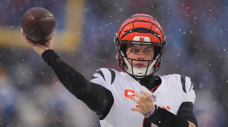 Cincinnati Bengals quarterback Joe Burrow throws a pass during warmups before an NFL football game against the Buffalo Bills, Sunday, Dec. 7, 2025, in Orchard Park, N.Y. (AP Photo/Gene J. Puskar)