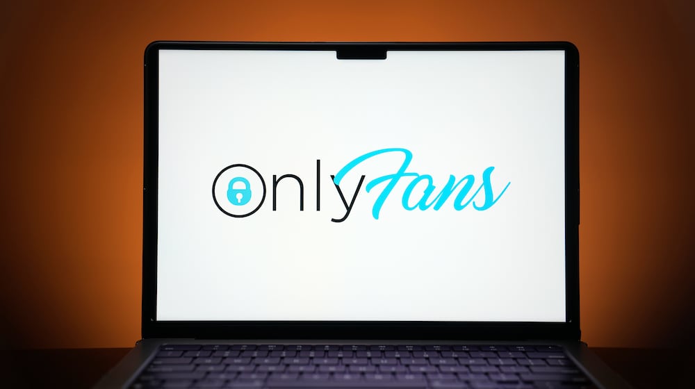 FILE - The OnlyFans logo is seen on a computer monitor in this posed photo, Dec. 7, 2023, in St. Louis. (AP Photo/Jeff Roberson, File)