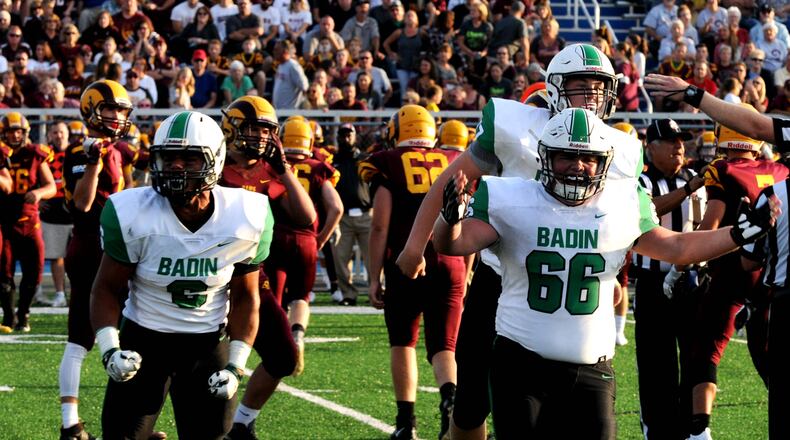 Badin players celebrate after recovering a Ross fumble during the first quarter of the Rams’ season opener at Hamilton’s Virgil Schwarm Stadium last Friday. Badin won 36-6. CONTRIBUTED PHOTO BY DAVID A. MOODIE