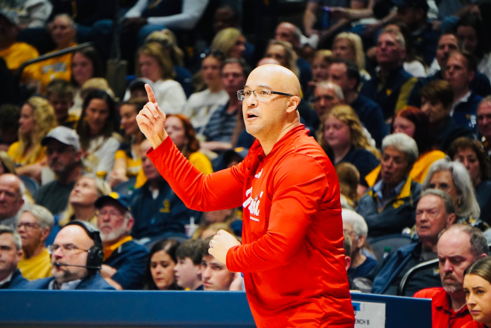 Miami coach Glenn Box directs his players during the RedHawks' NCAA Tournament game against West Virginia on Saturday, March 21, 2026, at Hope Coliseum in Morgantown, W.Va. CHRIS VOGT / CONTRIBUTED