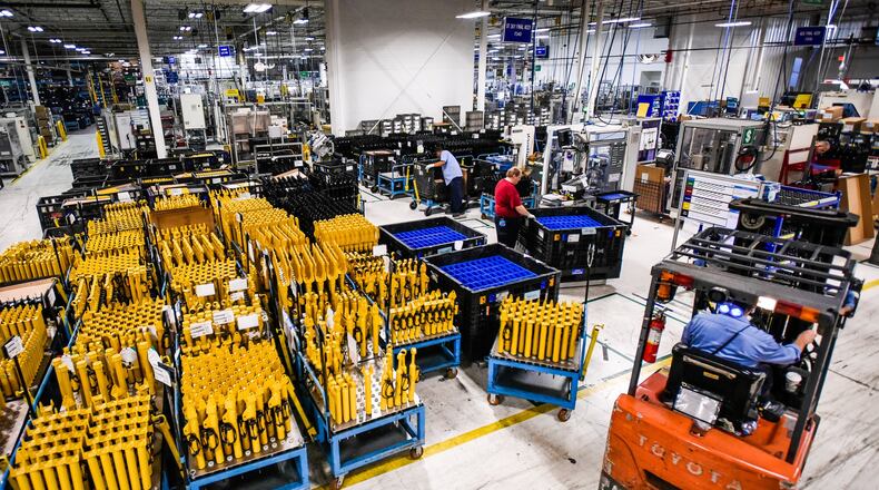 George Harp delivers shock absorber products to the next stage of production Thursday, April 20 at ThyssenKrupp Bilstein in Hamilton. NICK GRAHAM/STAFFGeorge Harp delivers shock absorber products to the next stage of production Thursday, April 20 at ThyssenKrupp Bilstein in Hamilton. NICK GRAHAM/STAFF