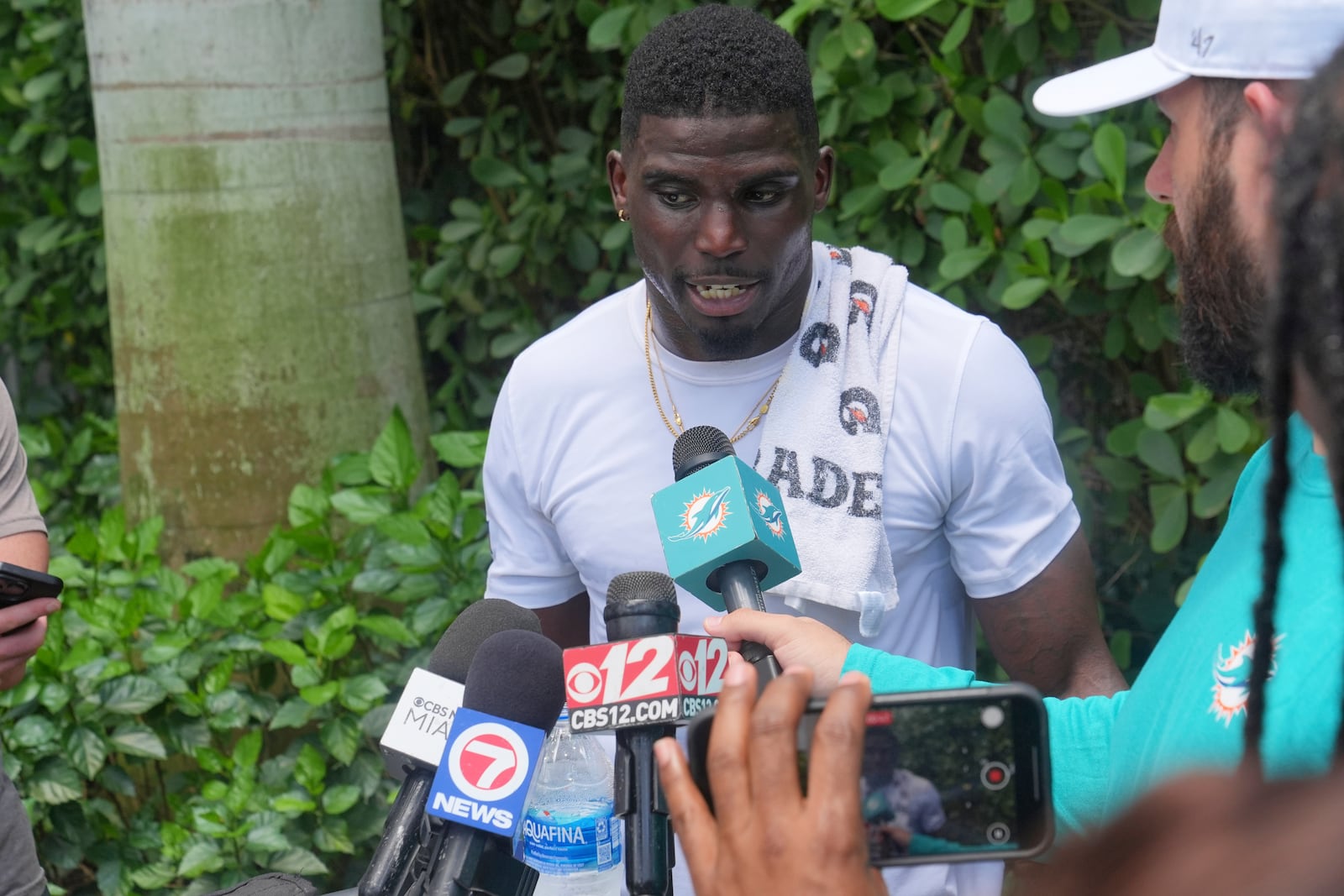Miami Dolphins wide receiver Tyreek Hill gestures during an interview following an NFL football practice, Wednesday, May 28, 2025, in Miami Gardens, Fla. (AP Photo/Marta Lavandier)