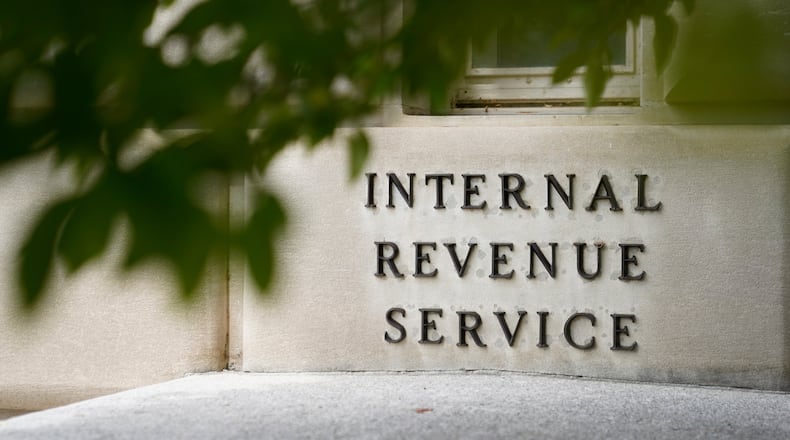 FILE - A sign is displayed outside the Internal Revenue Service building May 4, 2021, in Washington. (AP Photo/Patrick Semansky, File)