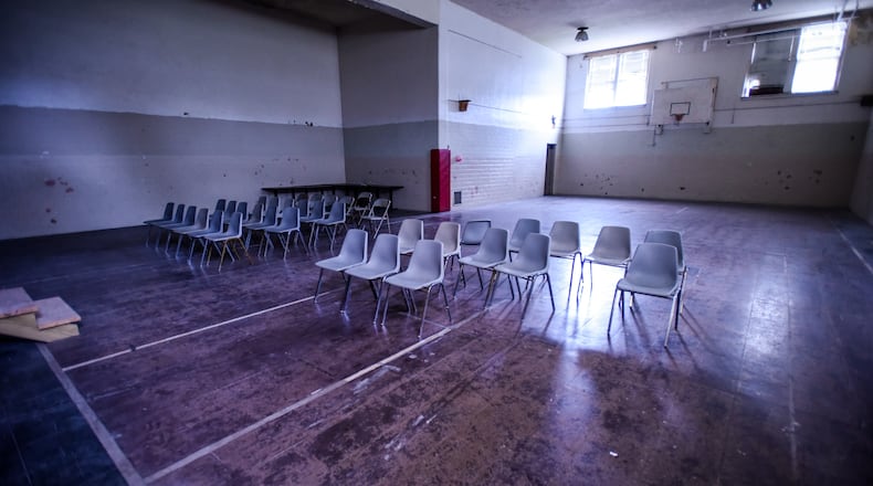 A crew for “Paradium,” a new television show that explores paranormal activity, will film Wednesday, Aug. 23, at the former Poasttown Elementary School in Madison Twp. NICK GRAHAM/STAFF