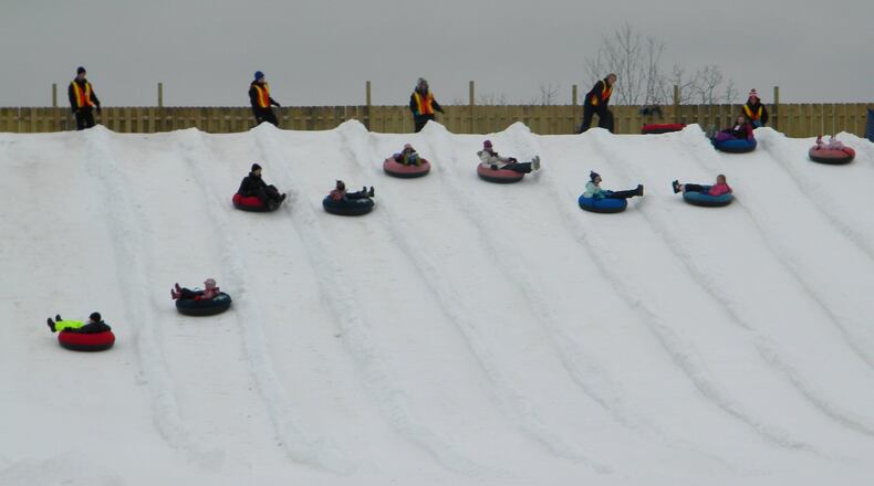 Snow tubing at Beach Mountain at Beach Waterpark in Mason offers a fun, outdoor experience for guests of all ages. CONTRIBUTED
