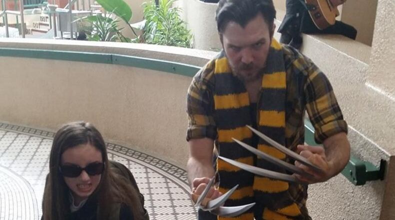Two X-Men fans do their best Wolverine and X-23 impressions at the Animatic Con. CONTRIBUTED