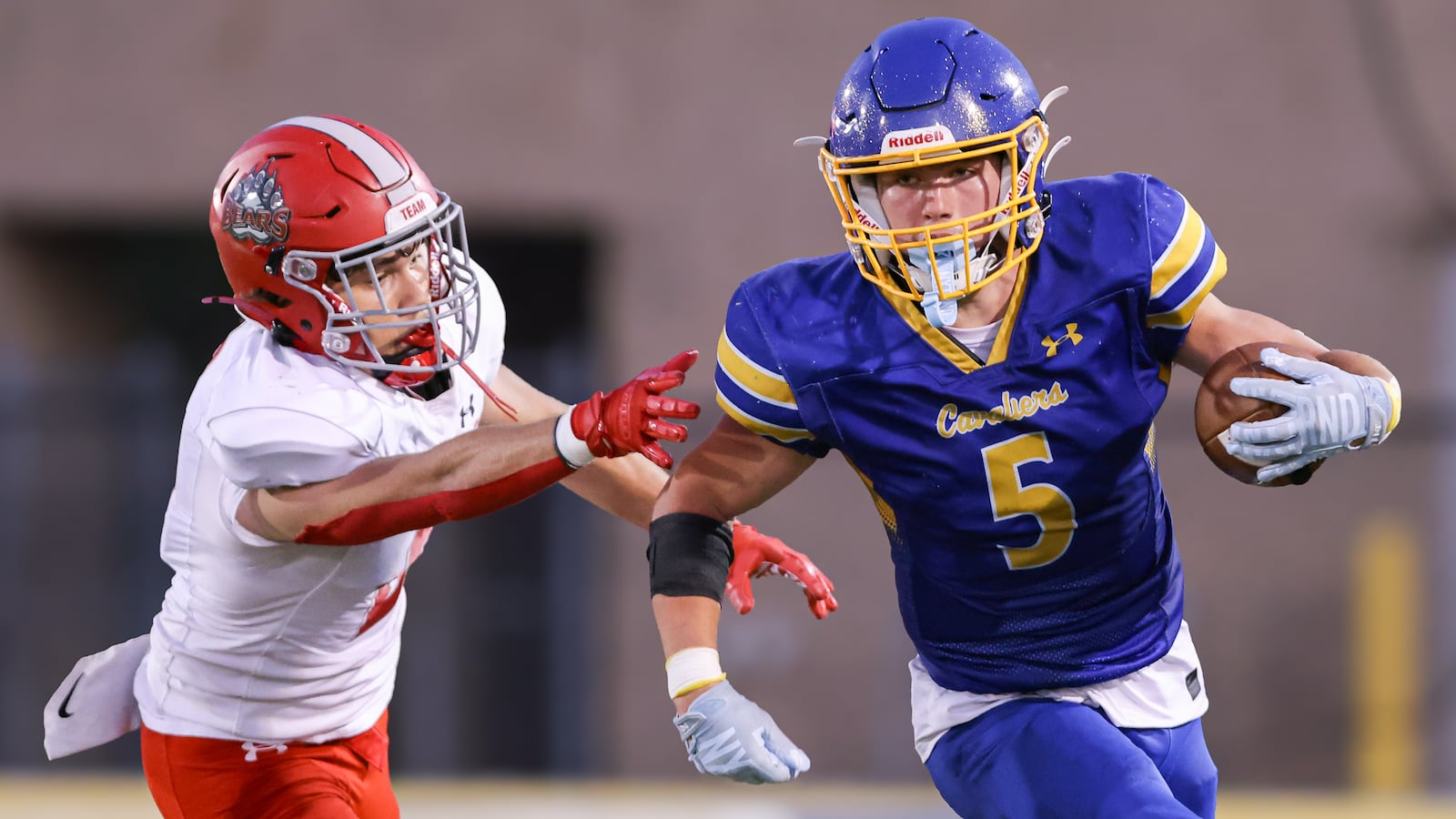 Lehman Catholic senior receiver Evan O'Leary runs with pressure from Northridge's Dylan Truesdale during a Three Rivers Conference game on Thursday, Sept. 11 at Sidney Memorial Stadium. BRYANT BILLING / STAFF