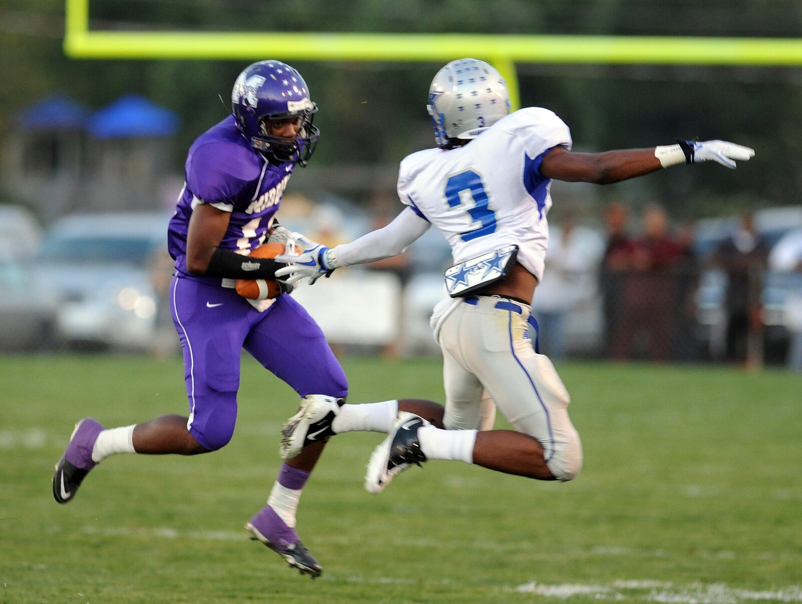 Middletown's Donte Holdbrook (left) catches a pass   during a 2010 game against Hamilton. 