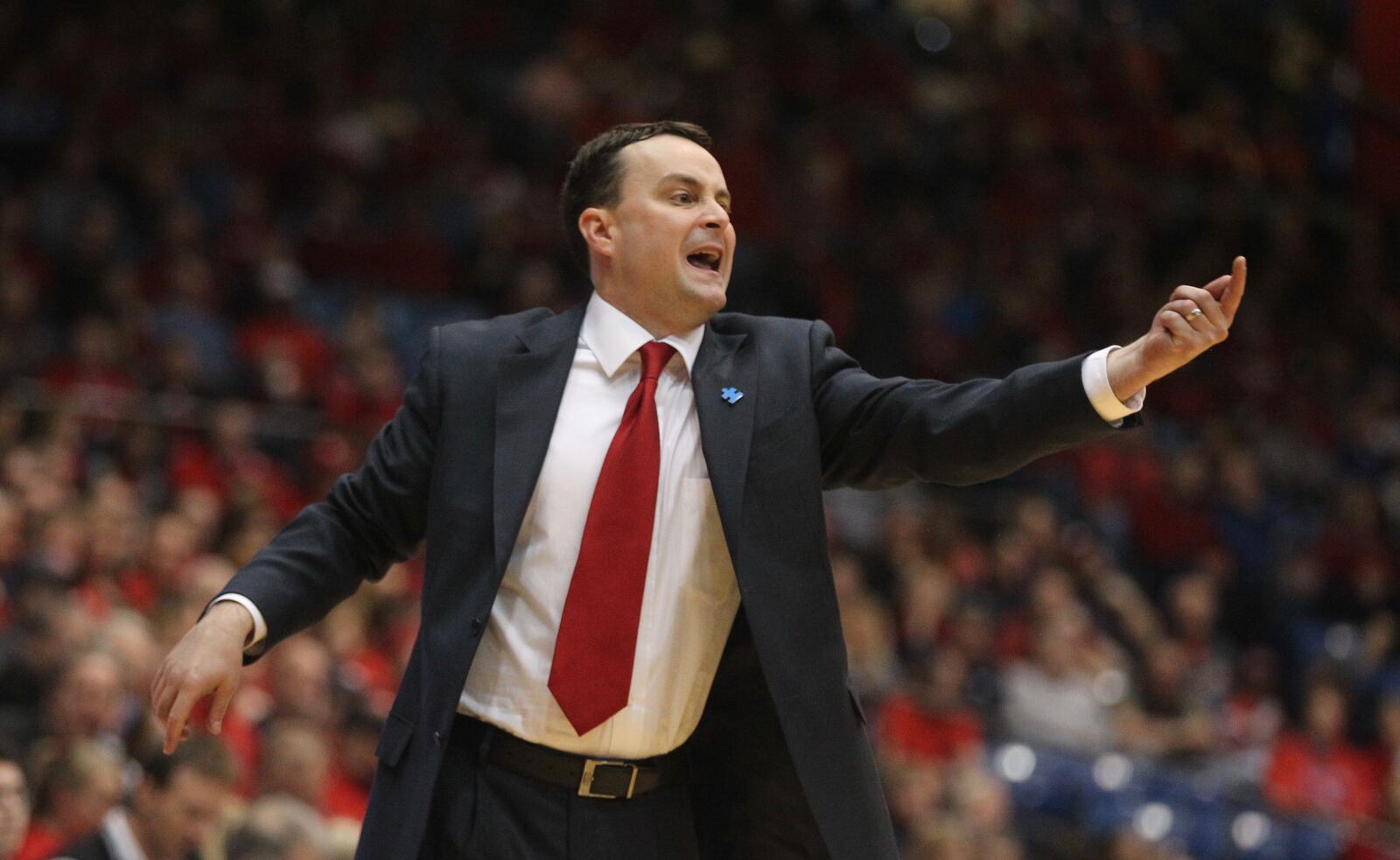 Dayton’s Archie Miller shouts to his players during a game against Duquesne on Saturday, Feb. 4, 2017, at UD Arena. David Jablonski/Staff