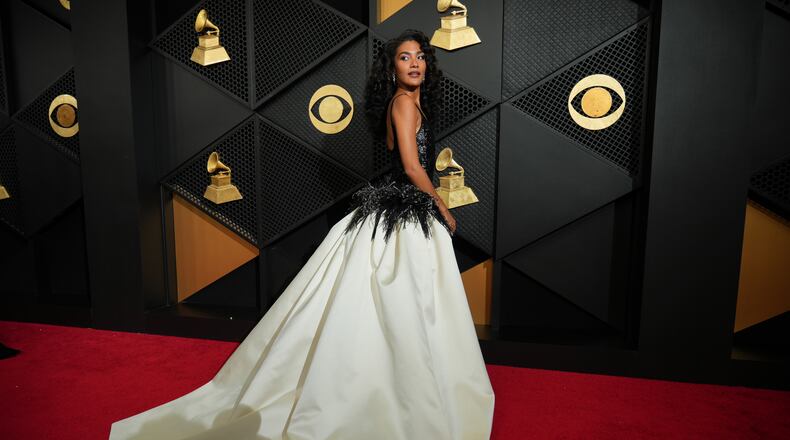 Olivia Dean arrives at the 68th annual Grammy Awards on Sunday, Feb. 1, 2026, in Los Angeles. (Photo by Jordan Strauss/Invision/AP)