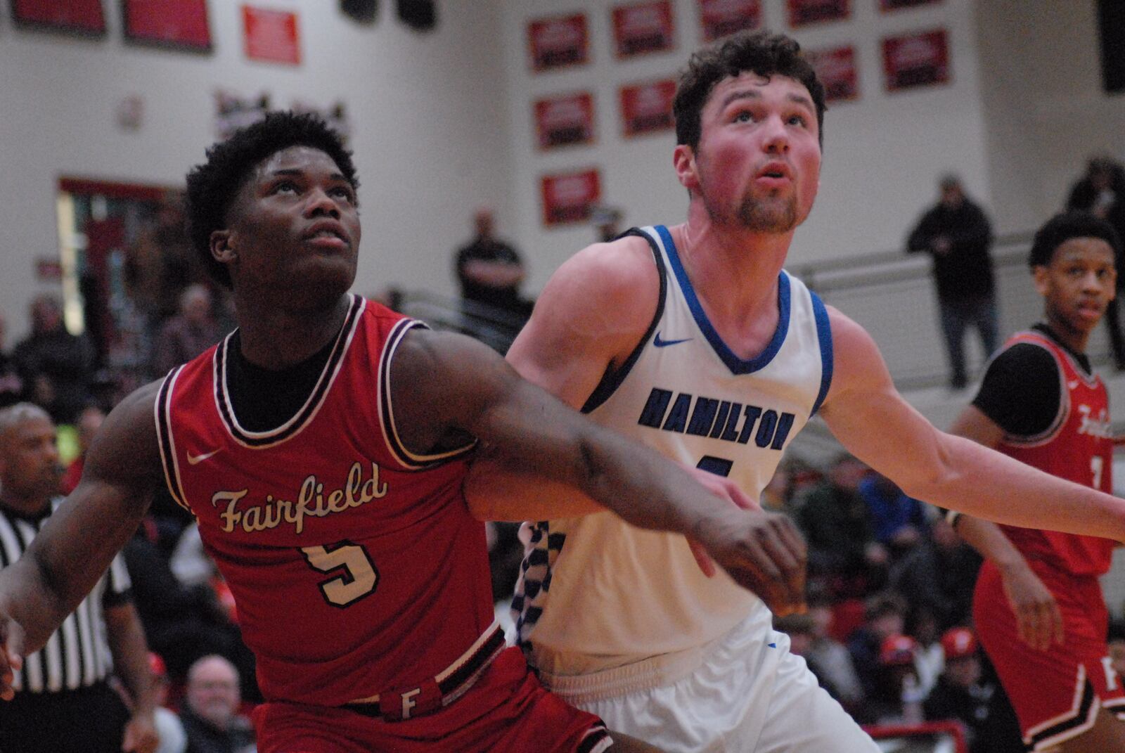 Fairfield's Raymir Coney boxes out Hamilton's Peyton Davis on Wednesday night. Chris Vogt/CONTRIBUTED
