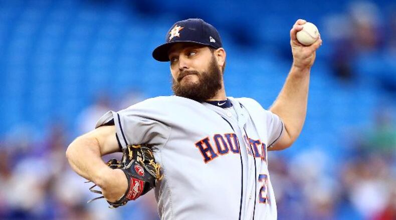 TORONTO, ON - AUGUST 30: Wade Miley #20 of the Houston Astros delivers a pitch in the first inning during a MLB game against the Toronto Blue Jays at Rogers Centre on August 30, 2019 in Toronto, Canada. (Photo by Vaughn Ridley/Getty Images)