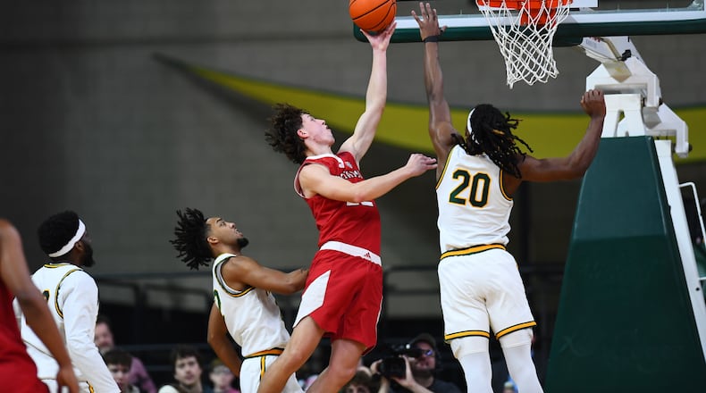 Miami’s Brant Byers goes up to the basket as Wright State’s Andrea Holden contests the shot on Tuesday at the Nutter Center. KYLE HENDRIX / CONTRIBUTED