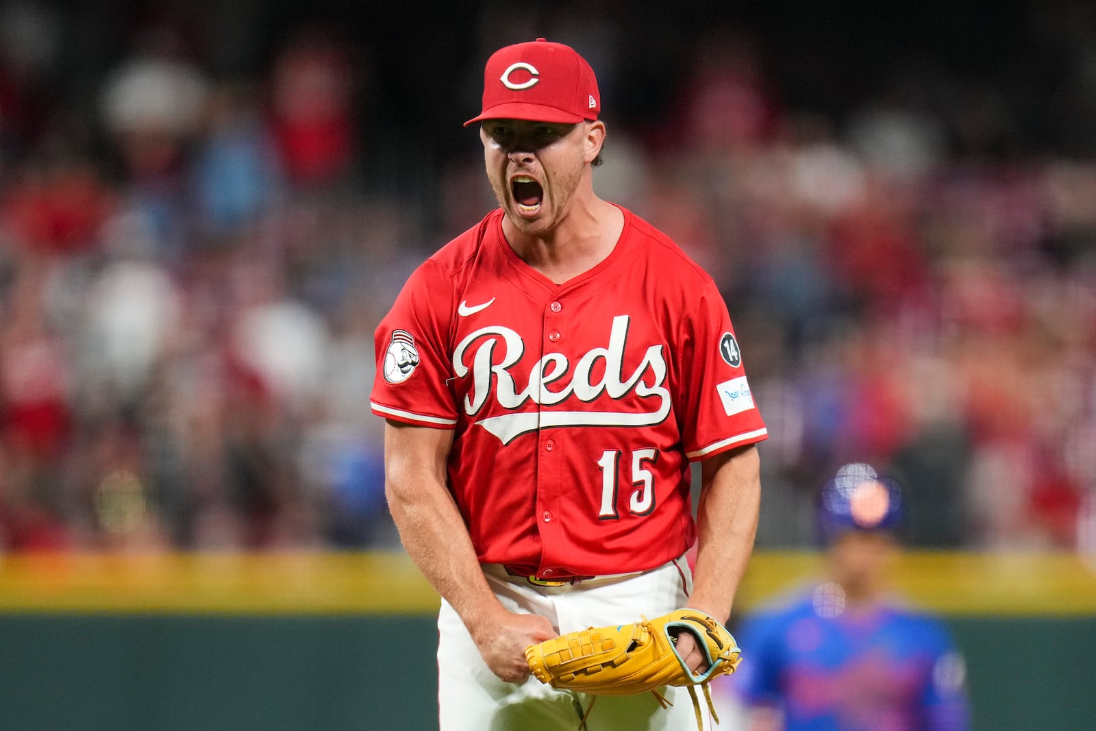 Cincinnati Reds pitcher Emilio Pagán reacts after striking out New York Mets' Pete Alonso during the ninth inning of a baseball game, Saturday, Sept. 6, 2025, in Cincinnati. (AP Photo/Jeff Dean)