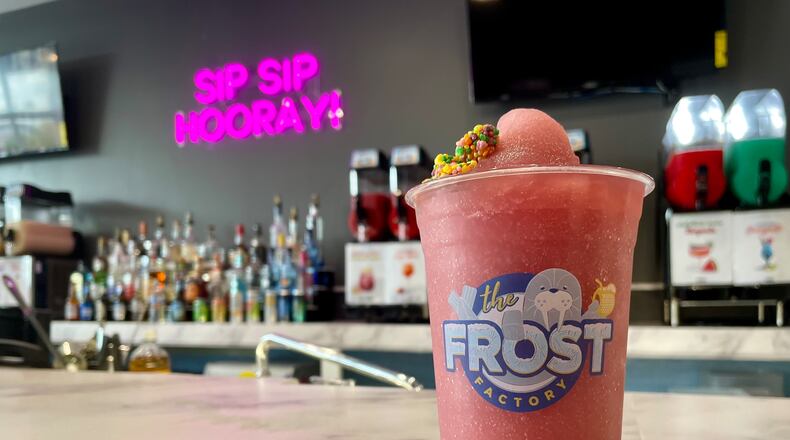 The Frost Factory, a boutique bar with boozy slushies, cocktails, shots and more, is now open at Austin Landing. NATALIE JONES/STAFF