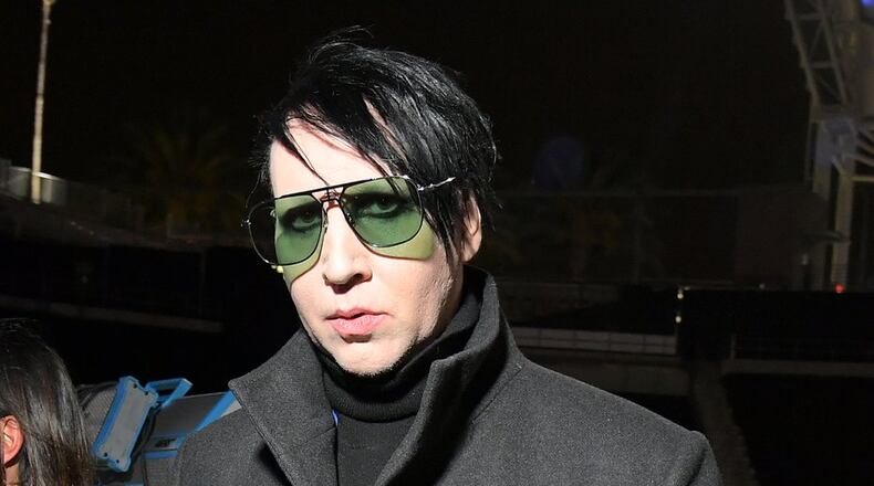 Marilyn Manson (above) and Rob Zombie will be at Riverbend Music Center on July 13. GETTY IMAGES