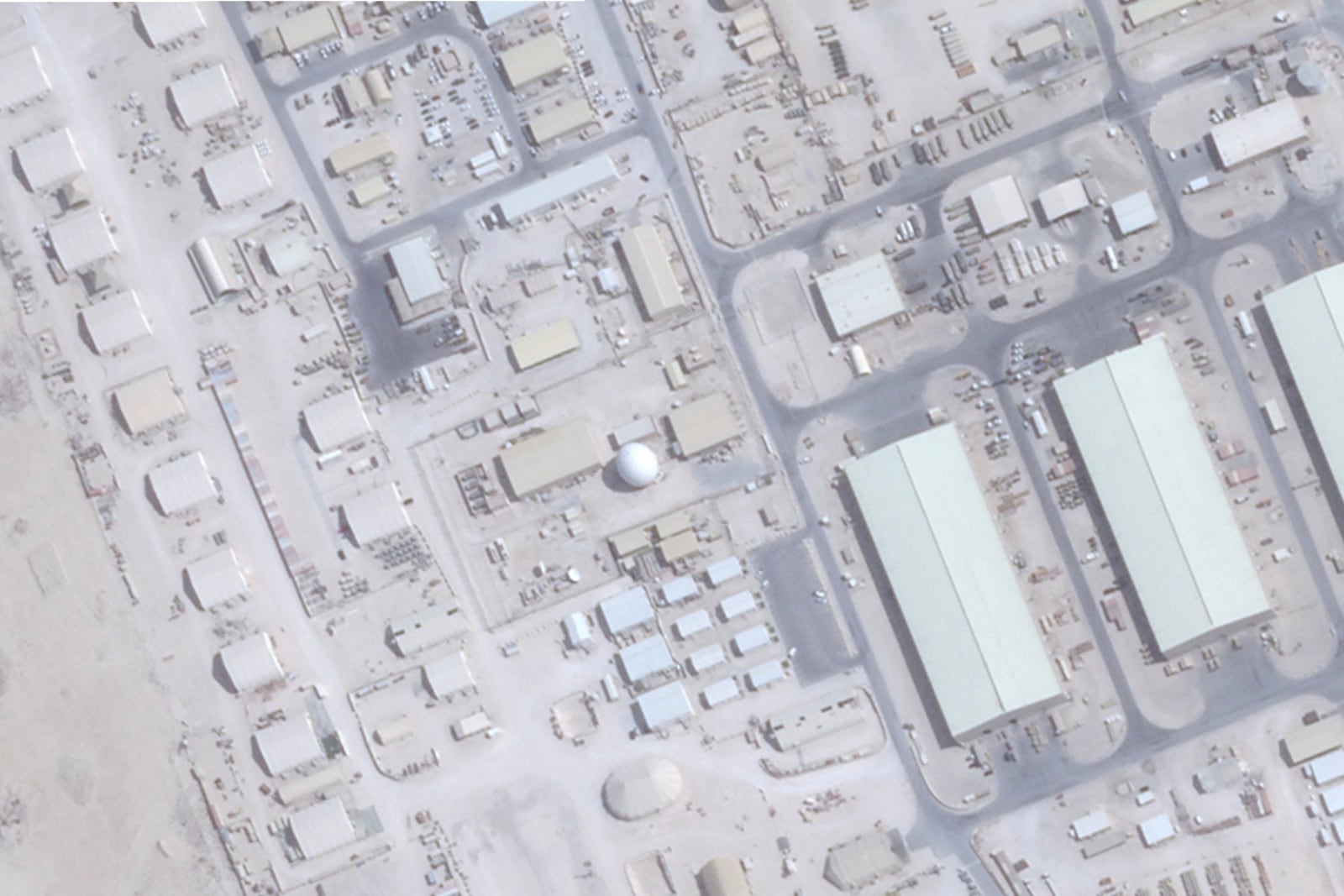 This satellite image from Planet Labs PBC shows modernized enterprise terminal, center, at the Al Udeid Air Base outside of Doha, Qatar, June 23, 2025. (Planet Labs PBC via AP)