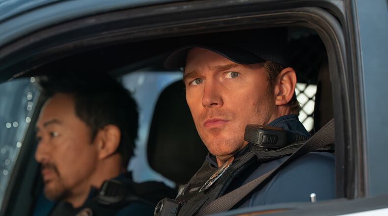 This image released by Amazon MGM Studios shows Kenneth Choi, left, and Chris Pratt in a scene from "Mercy." (Justin Lubin/Amazon MGM Studios via AP)