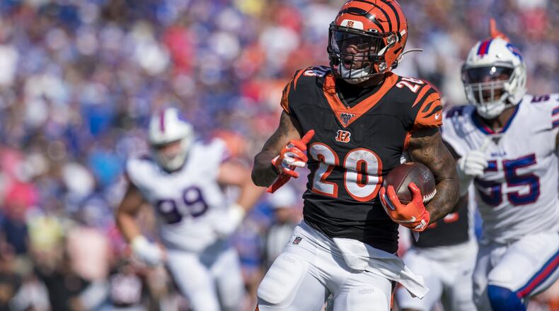 ORCHARD PARK, NY - SEPTEMBER 22: Joe Mixon #28 of the Cincinnati Bengals carries the ball for a first down during the fourth quarter against the Buffalo Bills at New Era Field on September 22, 2019 in Orchard Park, New York. Buffalo defeats Cincinnati 21-17. (Photo by Brett Carlsen/Getty Images)