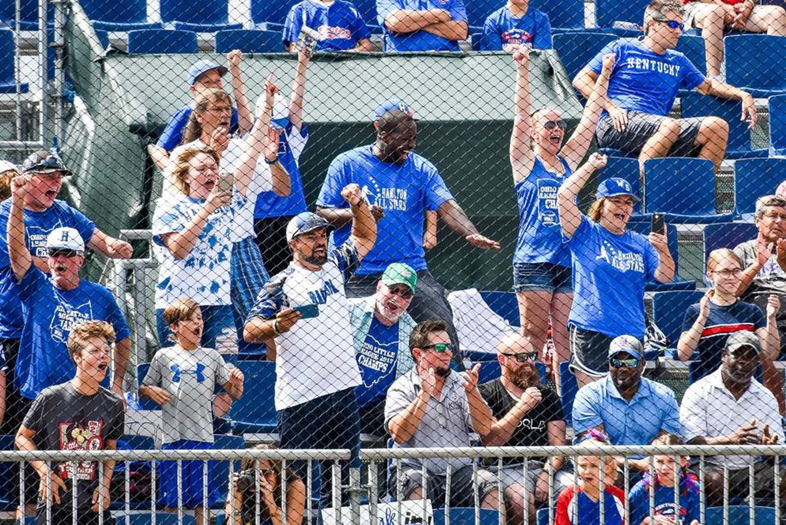 Hamilton West Side fans show their spirit Monday during a 10-2 victory over Grosse Pointe Woods-Shores (Mich.) in the Little League Great Lakes Regional at Grand Park Sports Campus in Westfield, Ind. NICK GRAHAM/STAFF