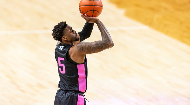 Penn State guard Jamari Wheeler (5) makes a three point shot against Nebraska in the first half during an NCAA college basketball game Tuesday, Feb. 23, 2021, in Lincoln, Neb. (AP Photo/John Peterson)