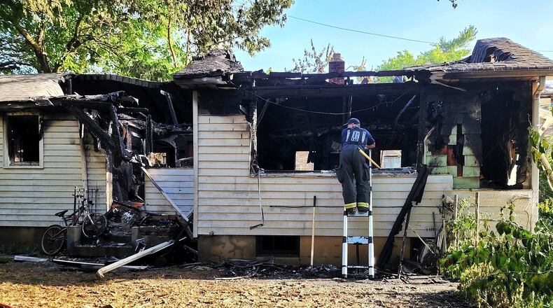 Hamilton firefighters were dispatched to the 3800 block of Pleasant Avenue for a structure fire and found heavy fire and smoke coming from the building, according to officials. NICK GRAHAM / STAFF