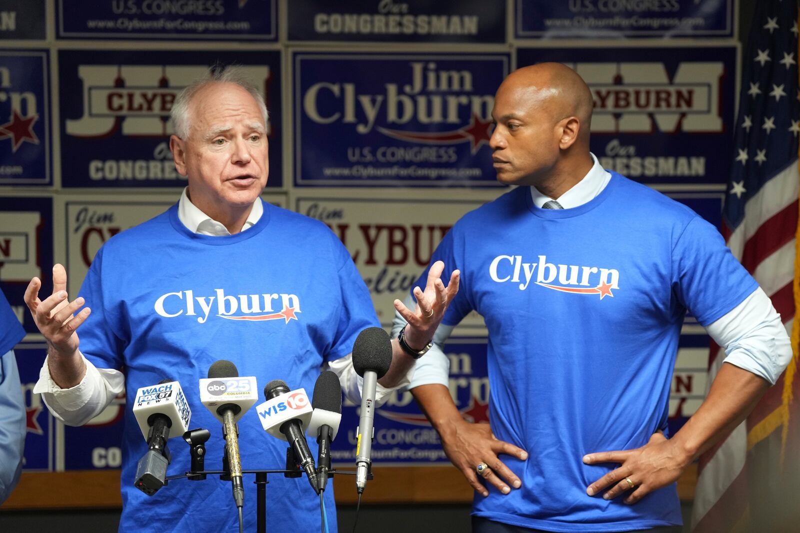 FILE - Minnesota Gov. Tim Walz, left, speaks to reporters as Maryland Gov. Wes Moore looks on at Rep. Jim Clyburn's World Famous Fish, Friday, May 30, 2025, in Columbia, S.C. (AP Photo/Meg Kinnard, File)