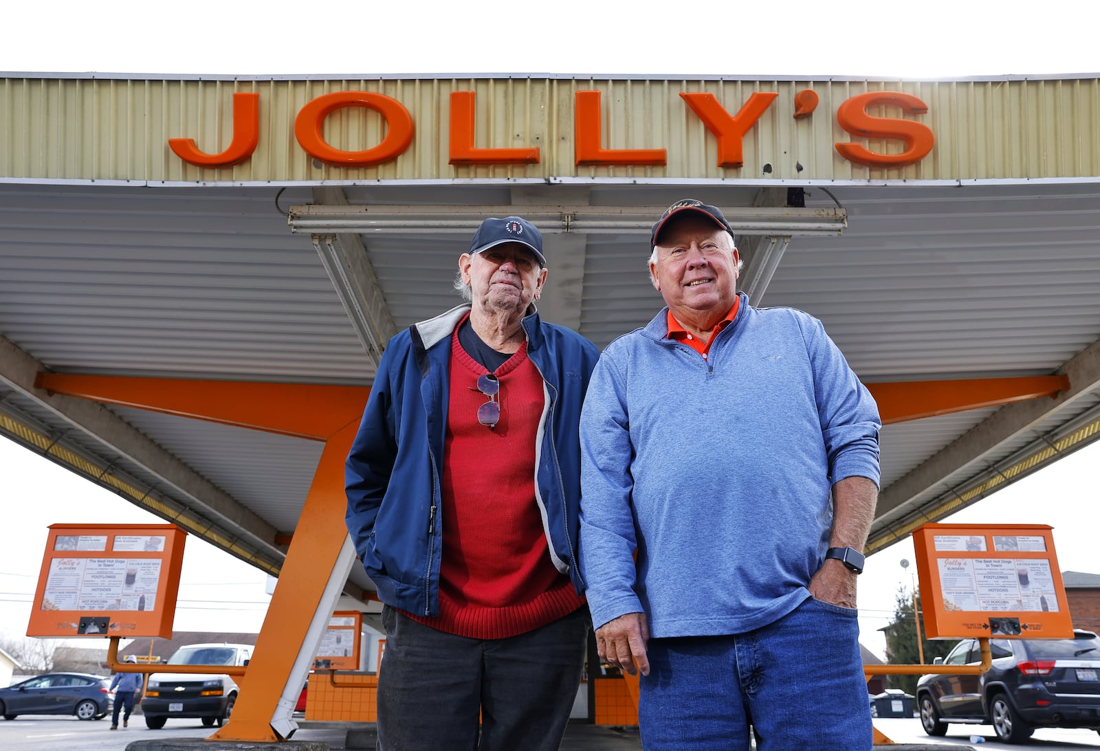 Mike, left, and Greg Jolivette stand outside Jolly's drive-in restaurant on Brookwood Ave. Wednesday, Feb. 16, 2022 in Hamilton. Jolly's is celebrating 85 years in business. NICK GRAHAM/STAFF