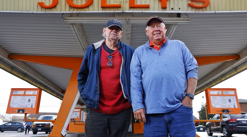 Mike, left, and Greg Jolivette stand outside Jolly's drive-in restaurant on Brookwood Ave. Wednesday, Feb. 16, 2022 in Hamilton. Jolly's is celebrating 85 years in business. NICK GRAHAM/STAFF