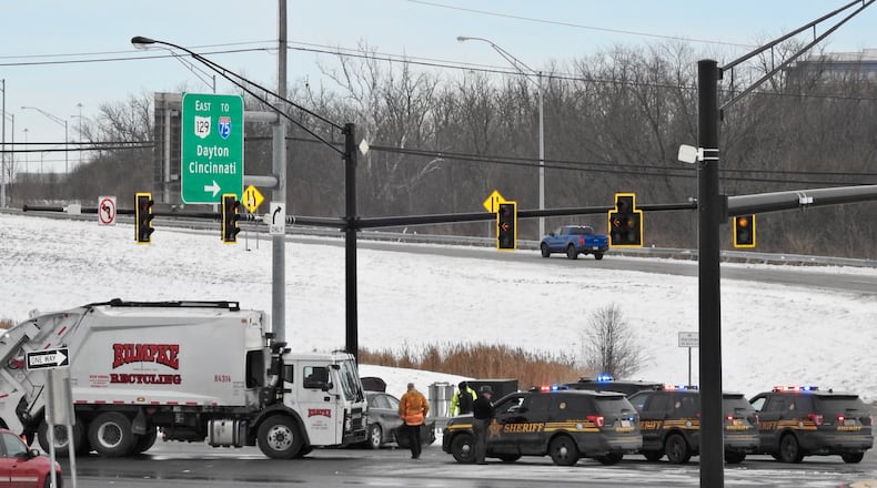 Three vehicles — including a Rumpke garbage truck — were involved in a crash on Cincinnati-Dayton Road, just south of Ohio 129, around 12:10 p.m. Tuesday, Jan. 22, 2019. NICK GRAHAM/STAFF