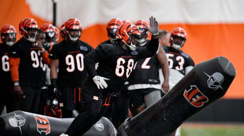 Cincinnati Bengals defensive tackle McKinnley Jackson (68) performs a drill during an NFL football practice, Tuesday, June 11, 2024, in Cincinnati. (AP Photo/Jeff Dean)