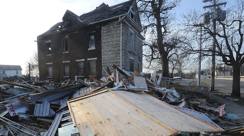 Demolition continues Thursday March 9, 2023, after a massive North Broadway Street fire Wednesday morning. Five people were found dead in the debris. MARSHALL GORBY\STAFF