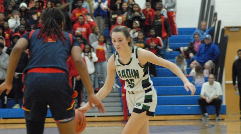Badin sophomore Gracie Cosgrove dribbles up court against Purcell Marian during a Division II regional final on Friday night at Springfield. The Rams fell 64-54. Chris Vogt/CONTRIBUTED