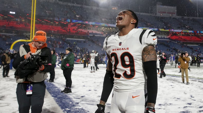 Cincinnati Bengals cornerback Cam Taylor-Britt (29) reacts after the Bengals beat the Buffalo Bills in an NFL division round football game, Sunday, Jan. 22, 2023, in Orchard Park, N.Y. (AP Photo/Joshua Bessex)
