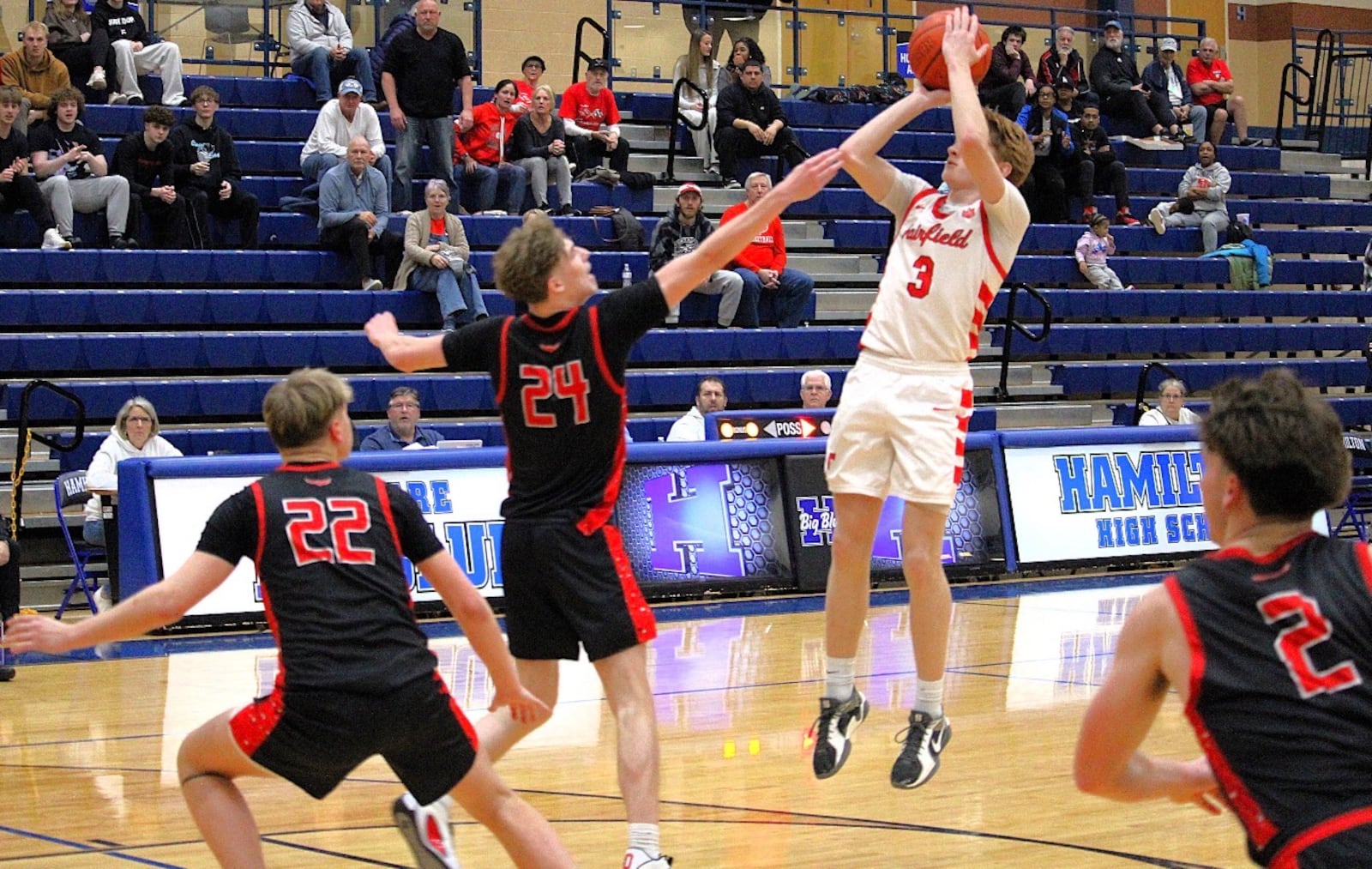 Fairfield’s Peyton Jones puts up a game-winning shot to beat Milford on Wednesday. MARK BRAAM / CONTRIBUTED