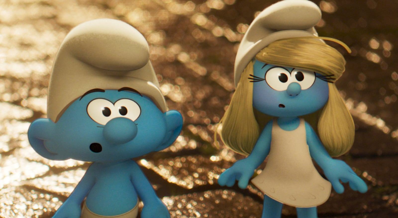 This image released by Paramount Animation shows No Name, voiced by James Corden, left, and Smurfette, voiced by Rihanna in a scene from "Smurfs." (Paramount Animation via AP)