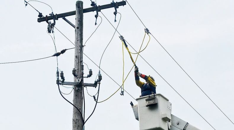 Electric rates are rising this summer for most customers, but the state's comparison website offers ways for people to find savings. MARSHALL GORBY / STAFF