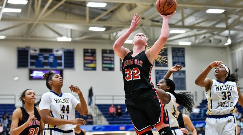 Lakota West’s Abby Prohaska puts up a shot during a Division I regional semifinal against Walnut Hills on March 7 at Fairmont’s Trent Arena. NICK GRAHAM/STAFF