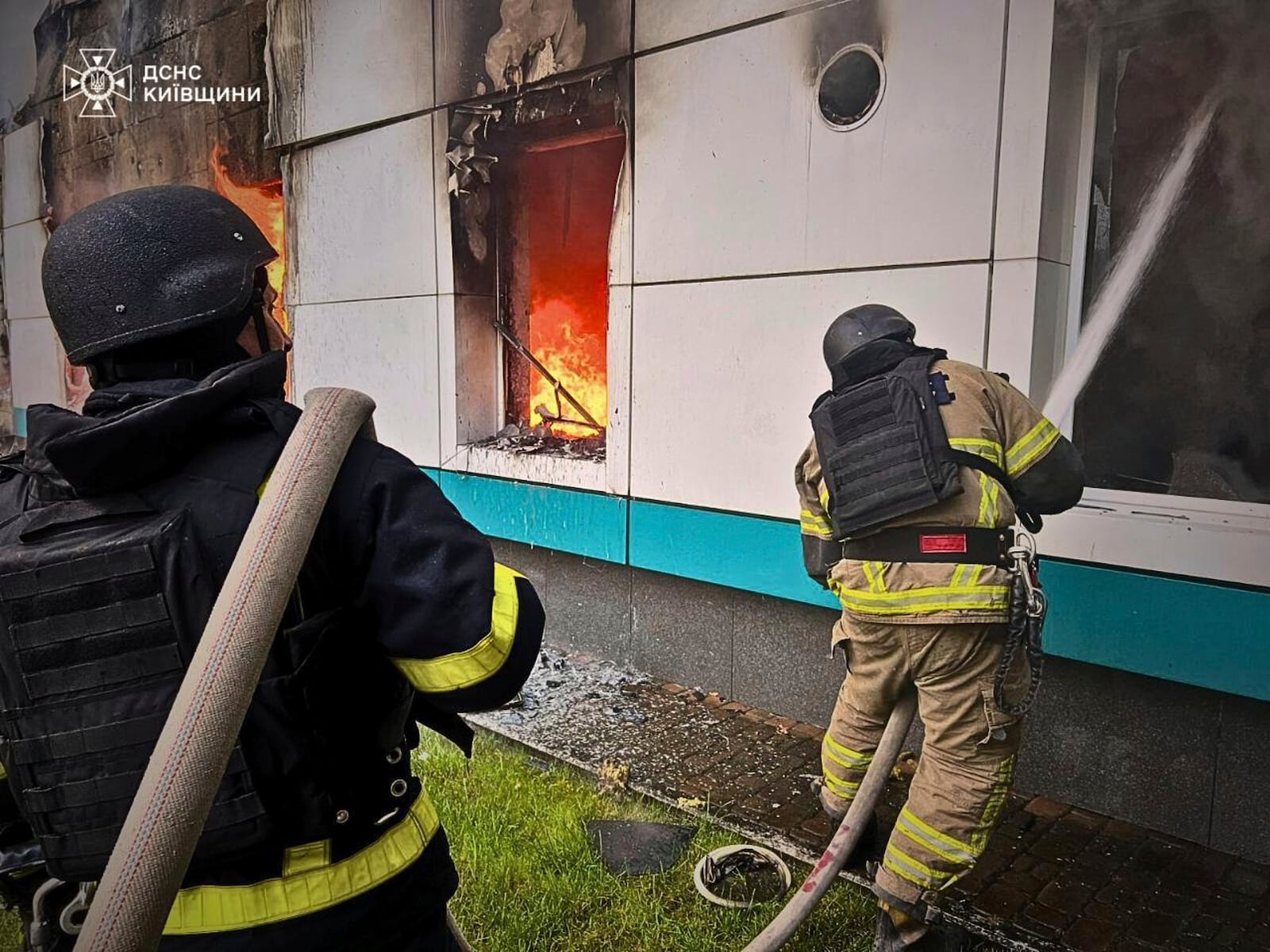 In this photo provided by the Ukrainian Emergency Service, firefighters put out the fire following Russia's drone attack in the Kyiv region, Ukraine, Sunday, May 18, 2025. (Ukrainian Emergency Service via AP)