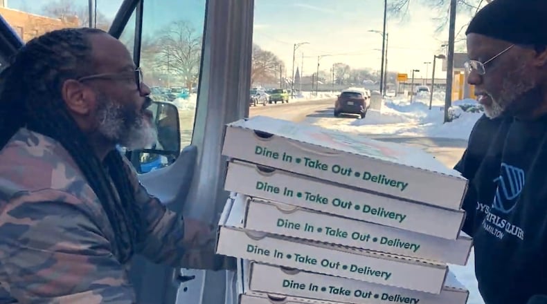 Boys & Girls Clubs of Hamilton partnered with Fairfield's Shared Harvest Food Bank and downtown Hamilton's All8Up Pizza, BBQ & Hoagies to provide meals and groceries Friday to 75 families across five club locations throughout the Hamilton and Forest Park communities. CONTRIBUTED