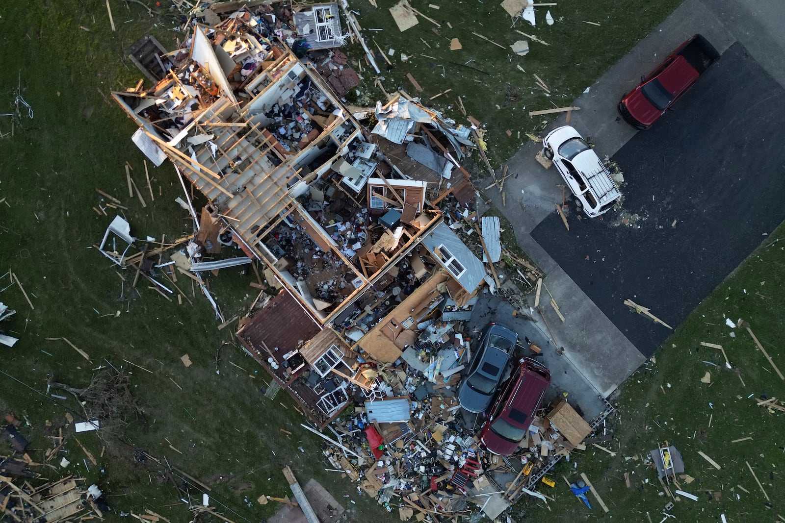 A home is destroyed after a severe storm passed through the area, Saturday, May 17, 2025, in London, Ky. (AP Photo/Carolyn Kaster)